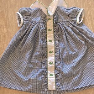 Little English dress with turtles.